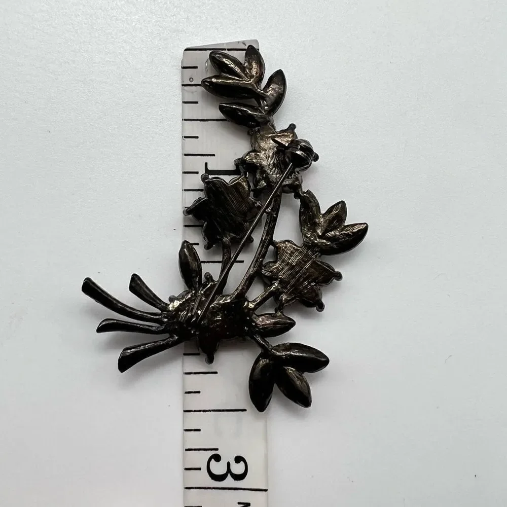 Vintage rhinestone floral‎ brooch stunning statement even black tie